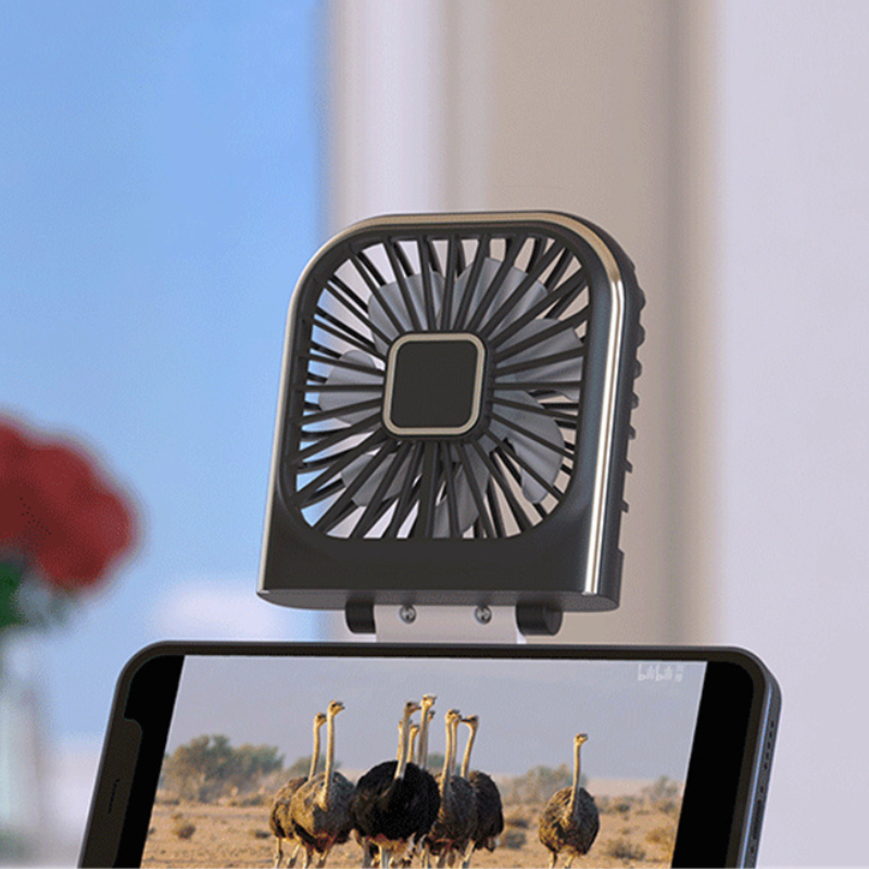 Mini ventilateur de poche 2 en 1 portable et rechargeable par USB, parfait pour apporter une brise rafraîchissante lors des longues attentes collection Confort & sécurité de la boutique petites Aventures couleur Blanc et Noir