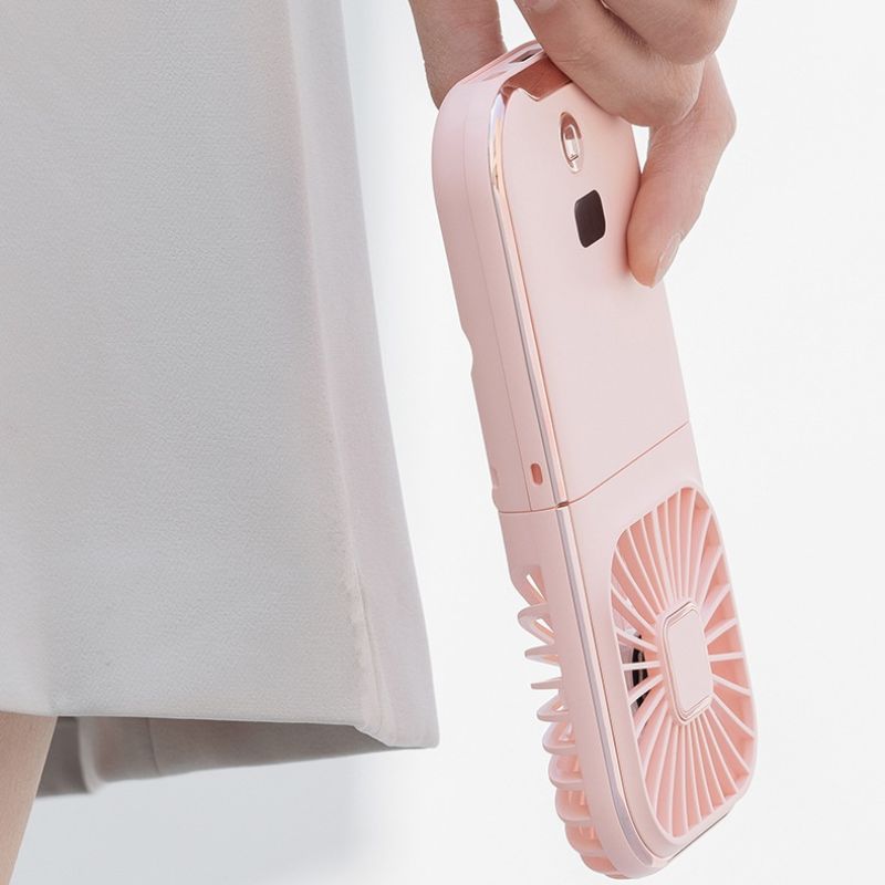 Mini ventilateur de poche 2 en 1 portable et rechargeable par USB, parfait pour apporter une brise rafraîchissante lors des longues attentes collection Confort & sécurité de la boutique petites Aventures couleur Blanc et Noir