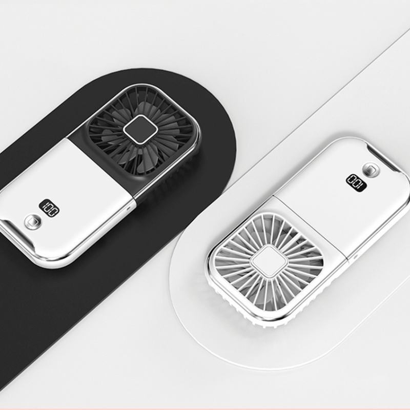 Mini ventilateur de poche 2 en 1 portable et rechargeable par USB, parfait pour apporter une brise rafraîchissante lors des longues attentes collection Confort & sécurité de la boutique petites Aventures couleur Blanc et Noir
