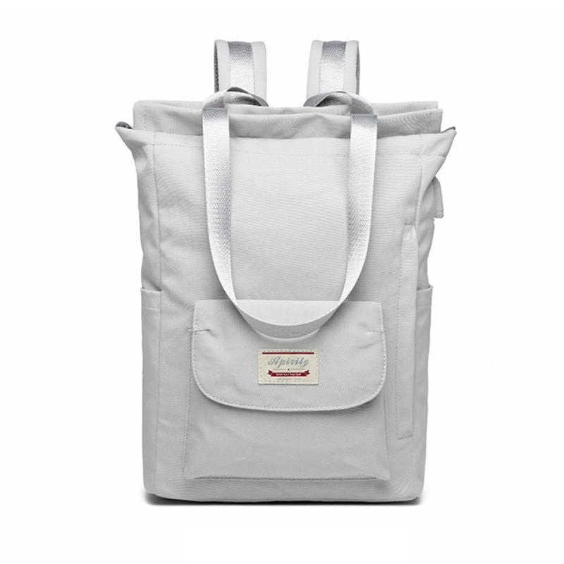 Sac à bandoulière en Tissu Oxford pour femme, idéal pour le voyage et le lifestyle, avec grand espace de rangement pour ordinateur portable de 15,6 pouces collection Bagages & Organisation de la boutique petites Aventures couleur gris