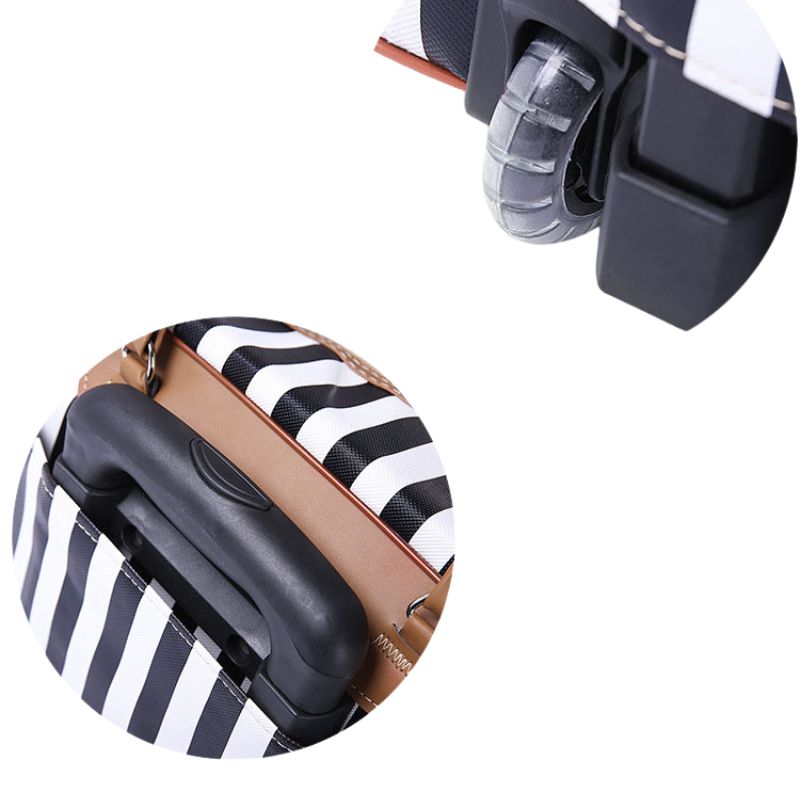 Roulette et poignée mi en avant du Sac de voyage à roulettes pour femmes de la collection bagage voyage de la boutique Petites Aventures Valise à roulettes Bagage à roulettes Bagage de voyage Sac de voyage rétro Accessoire de voyage Bagage pour femme