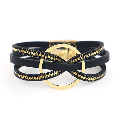 bracelets en cuir couleur noir croix torsadée cercle doré nœud papillon bijoux de charme fait à la main Summer Chic accessoires féminins tendance estivale bracelets multicouches collection Summer chic de la boutique Petites Aventures