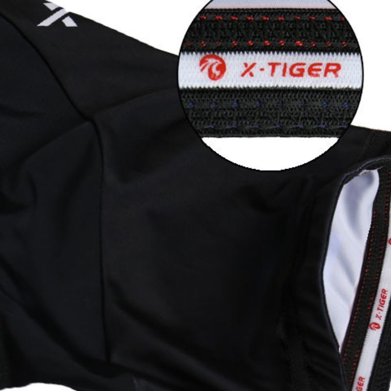 Ensemble cyclisme pour femmes tout noir, offrant protection UV, séchage rapide et une élégance sophistiquée.