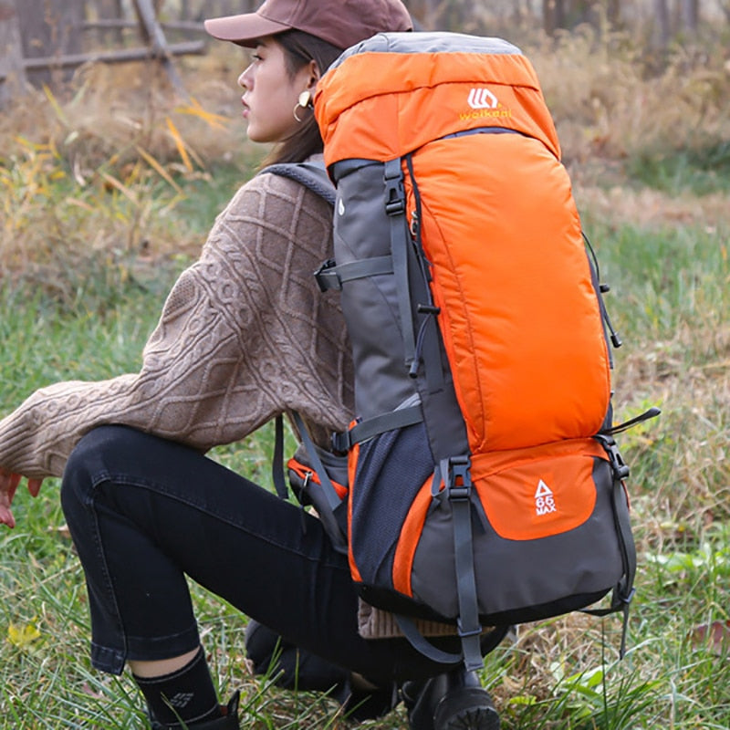 Sac à dos de randonnée 65L en nylon imperméable avec sangles ajustables, idéal pour le camping, l'escalade et le trekking