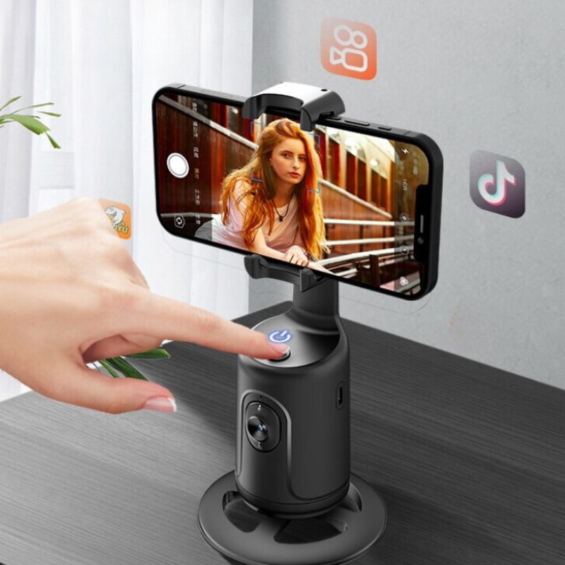 Support intelligent pour trépied de téléphone avec stabilisateur de cardan, rotation à 360° et suivi automatique du visage pour des prises de vue parfaites.